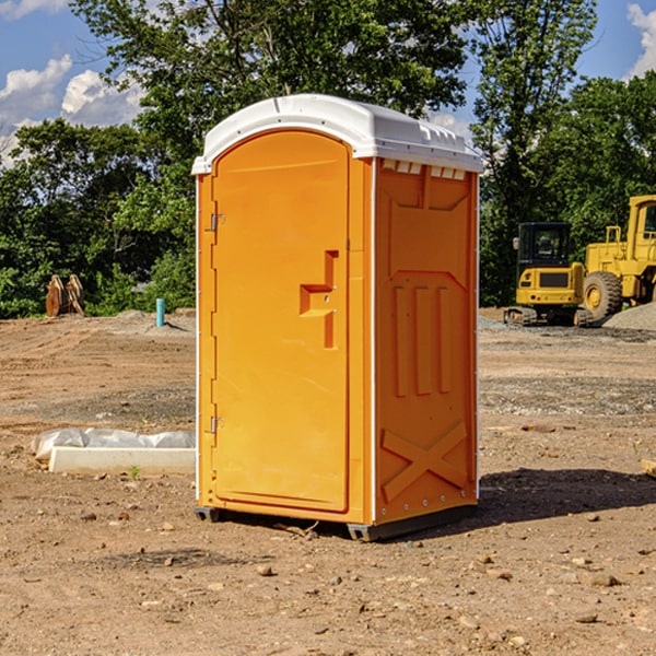 how often are the portable restrooms cleaned and serviced during a rental period in Manor Creek